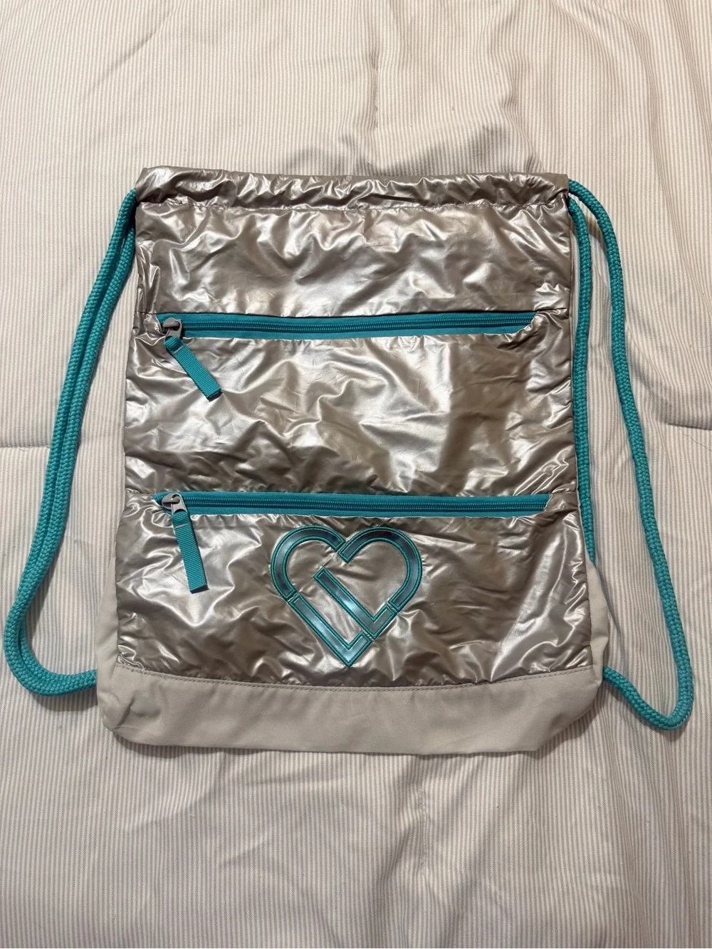 Y2K Vintage Metallic Silver Heart Drawstring Backpack with Teal Accents